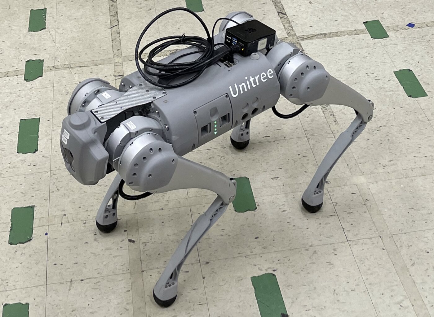 Unitree Go1 EDU quadruped robot with mounted edge computing hardware